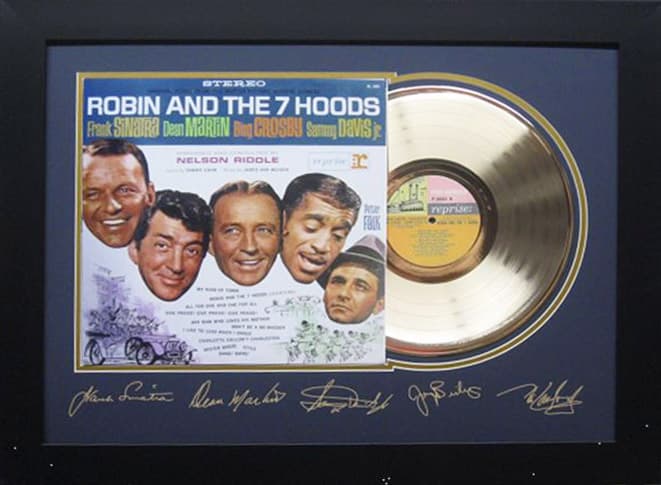 Framed gold record displayed beside the The Rat Pack Robin and the 7 Hoods album cover with a laser-reproduced signature, offered as a charity auction lot