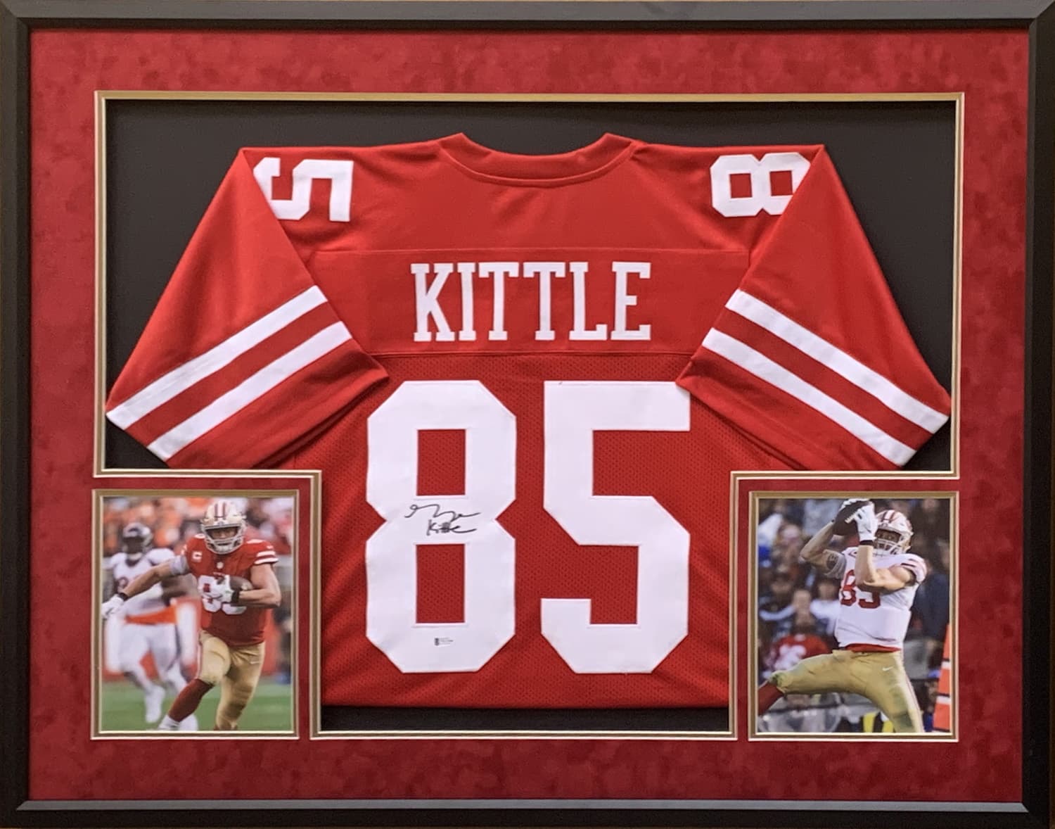 Framed red San Francisco 49ers jersey hand-signed by George Kittle, representing the sports and celebrity memorabilia category